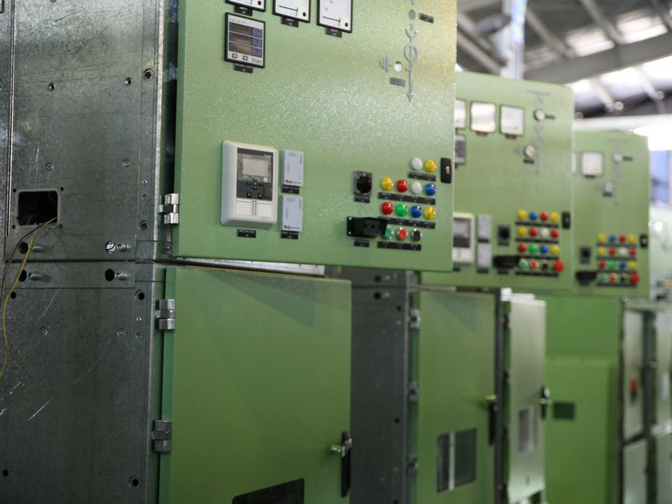 Industrial switchgear cabinets for power distribution.